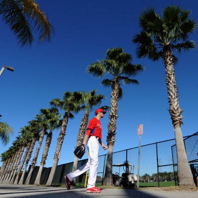 Cole Hamels heads out for workouts Sunday in Clearwater.